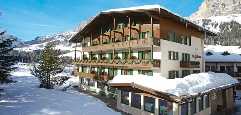 Chalet exterior with private balconies and mountain views