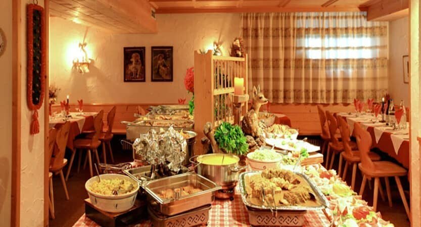 Dining area with buffet service and seating for large groups