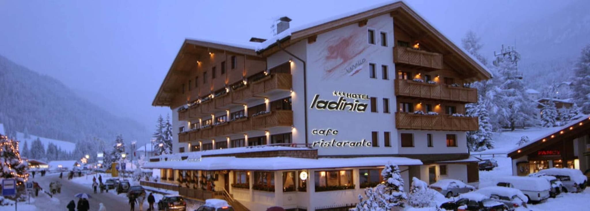 Ski-in lodge exterior with on-site restaurant and private balconies