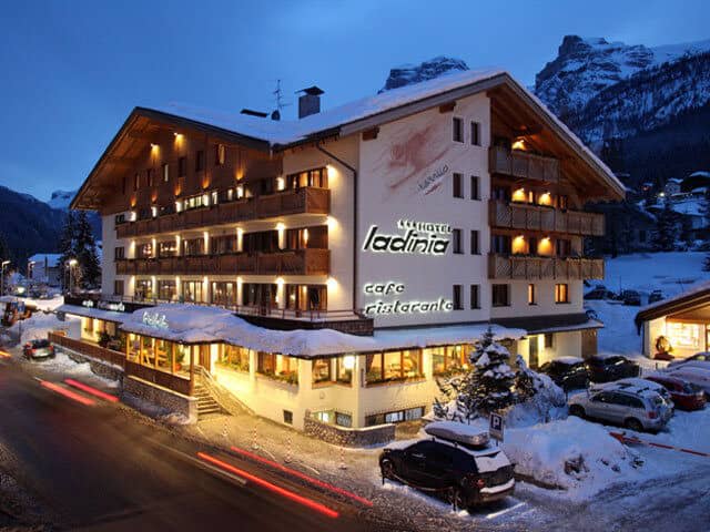 Chalet-style exterior with on-site restaurant and private guest parking
