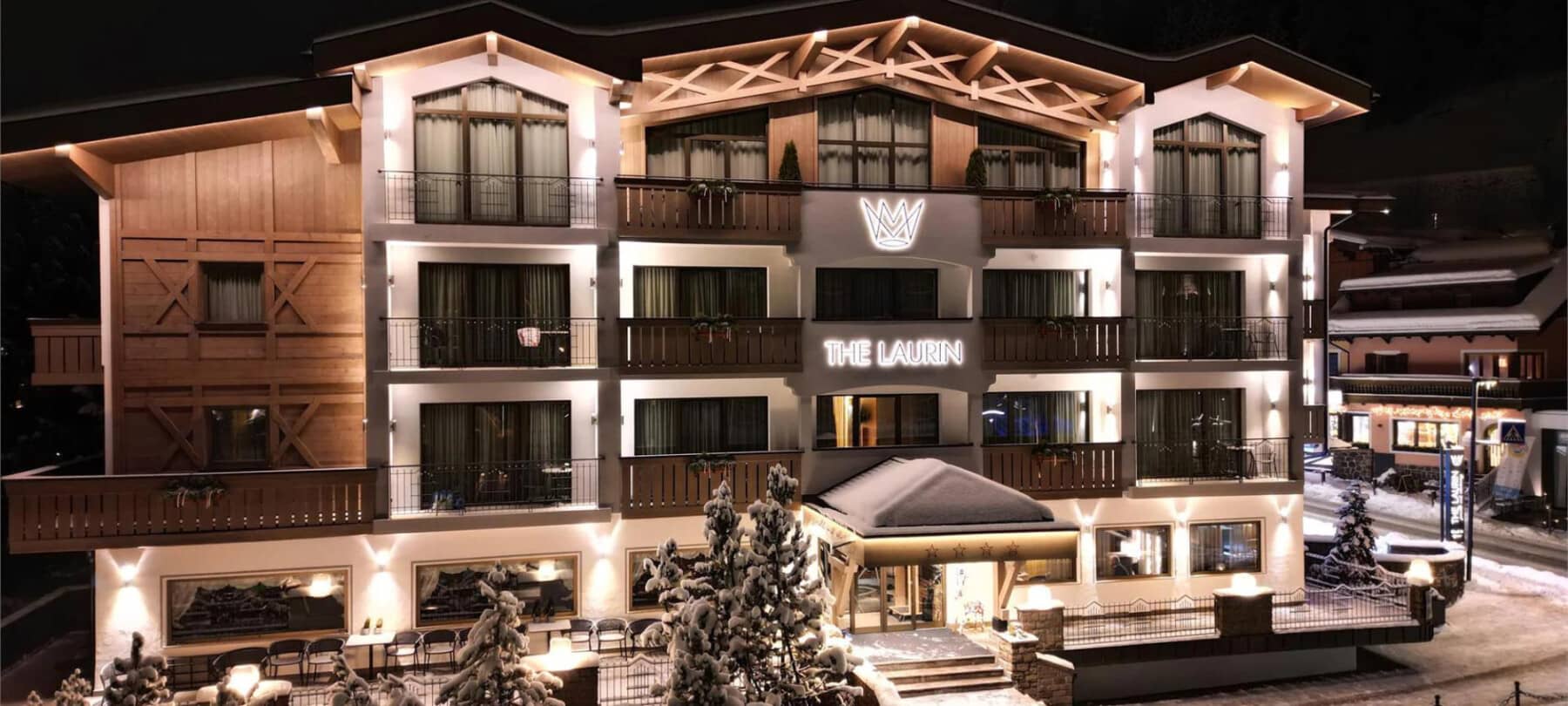 Chalet facade with private balconies for all upper-floor units