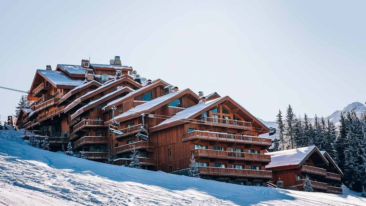 Slope-side timber chalet with ski-in/ski-out access and private balconies