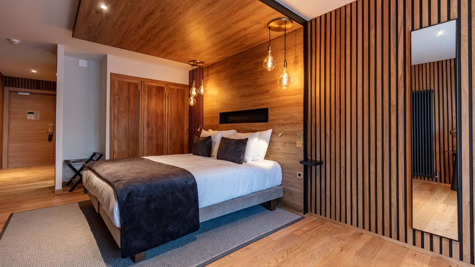 Bedroom with king bed and built-in wooden wardrobes