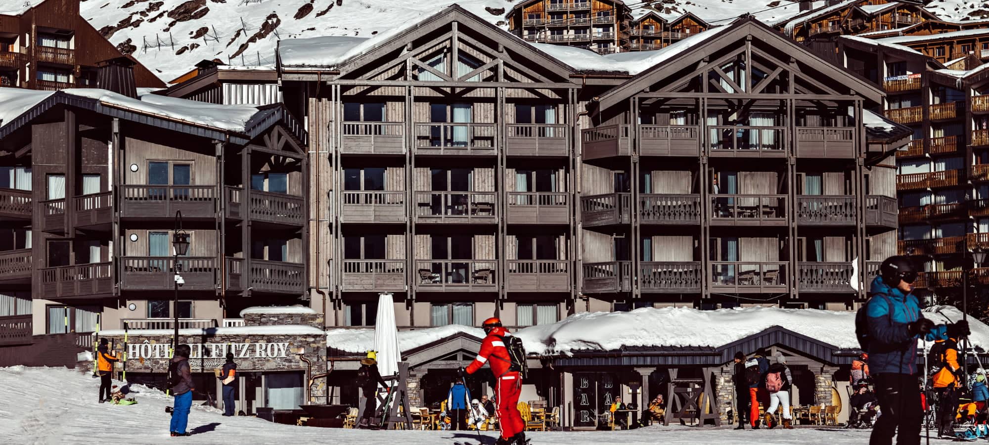 Ski-in/ski-out chalet exterior with private balconies and mountain views