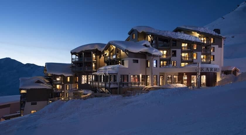 Ski-in, ski-out resort exterior with private balconies and on-site restaurant