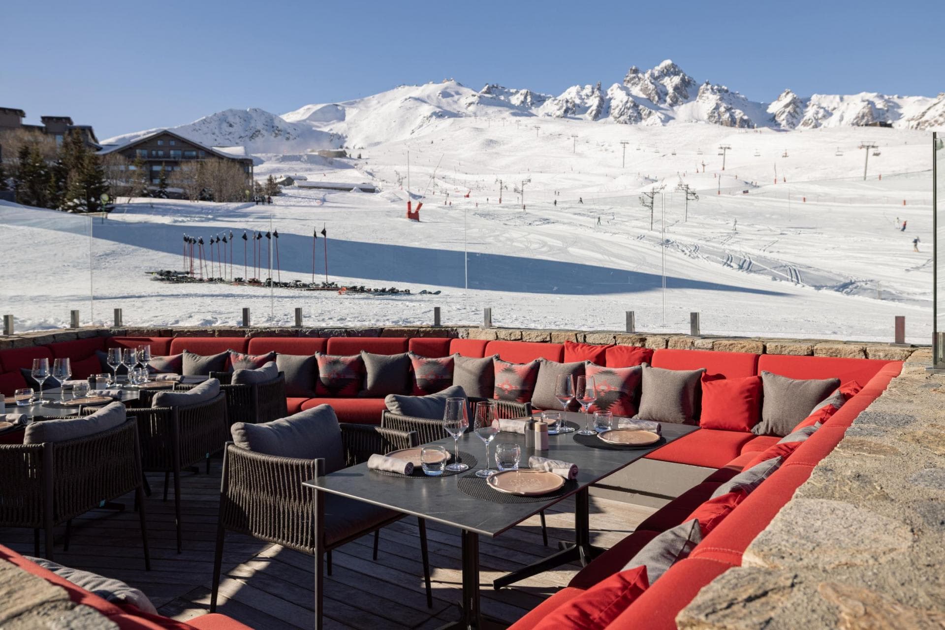 Ski-in/ski-out terrace with heated seating and mountain views
