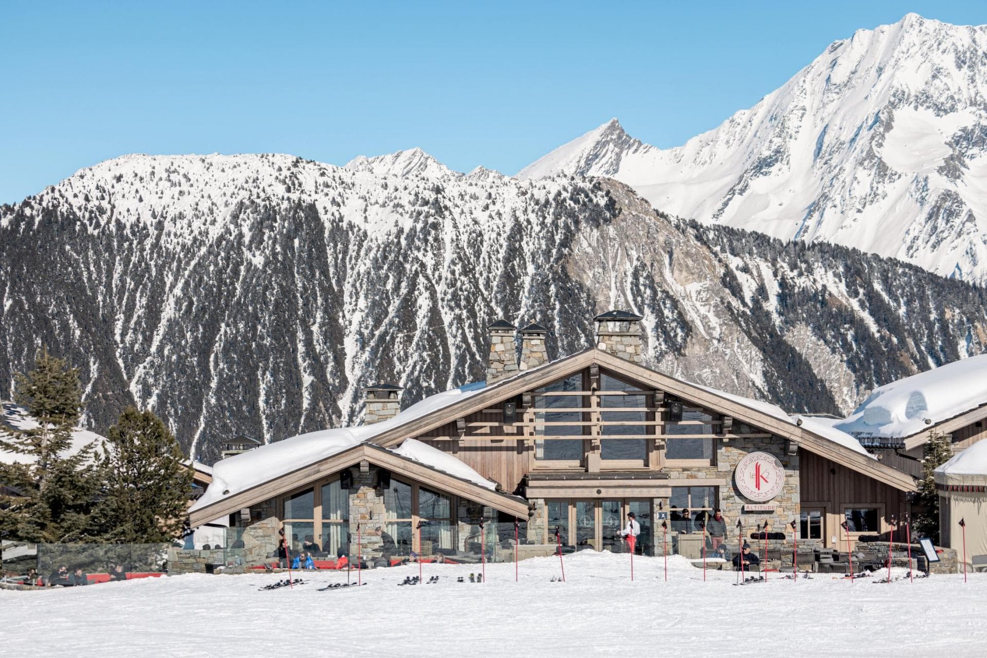 Ski-in, ski-out chalet entrance with sun terrace and mountain views