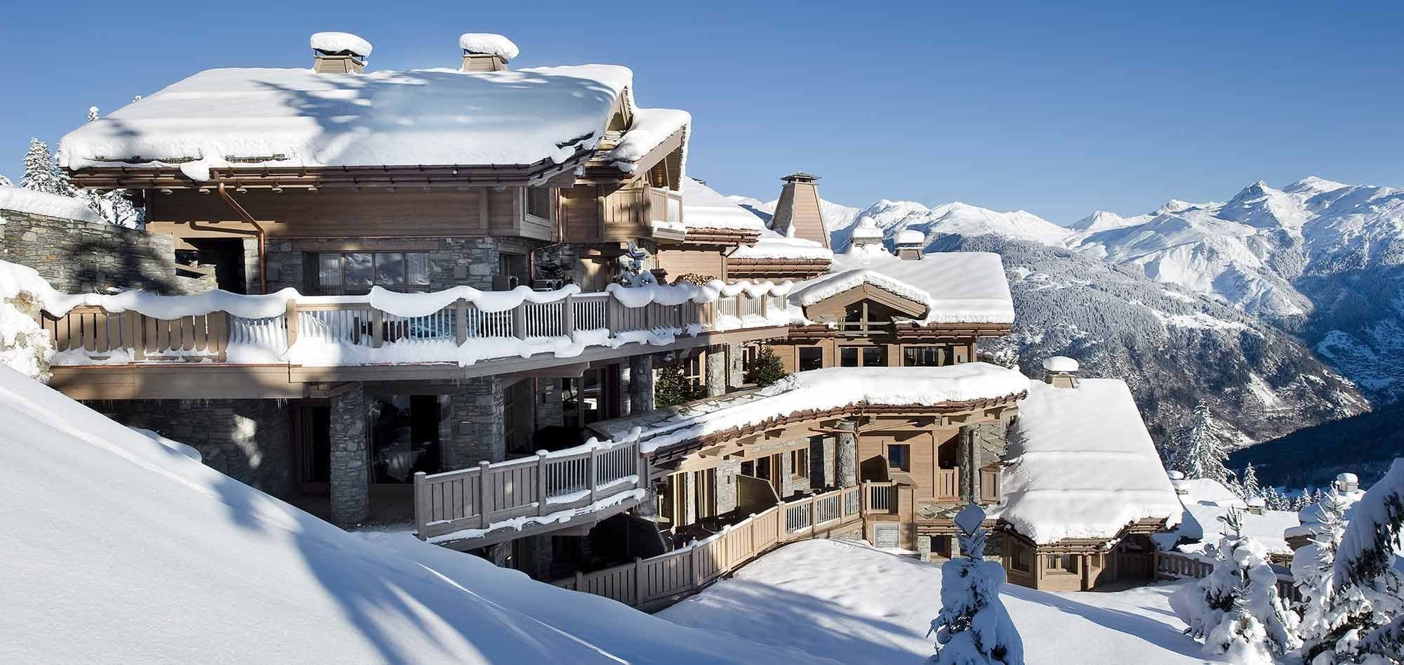 Ski-in, ski-out chalet with multi-level terraces and panoramic mountain views