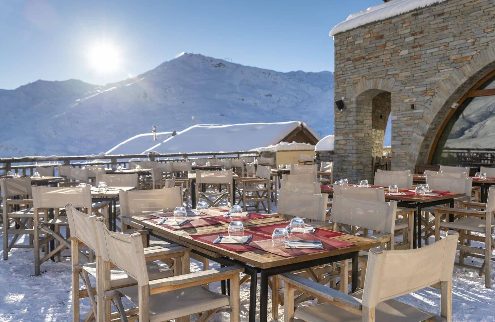 Outdoor terrace dining with mountain views and seating for over 30 guests