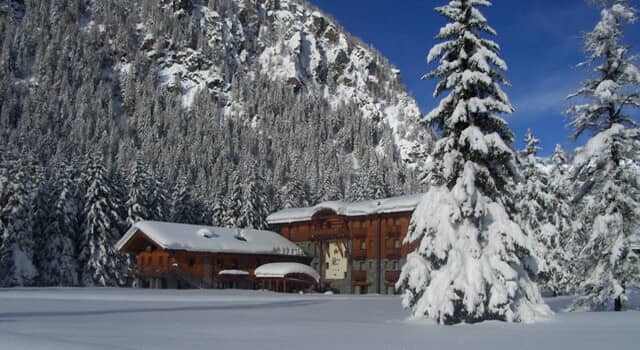 Mountain lodge with separate guest building and direct forest access