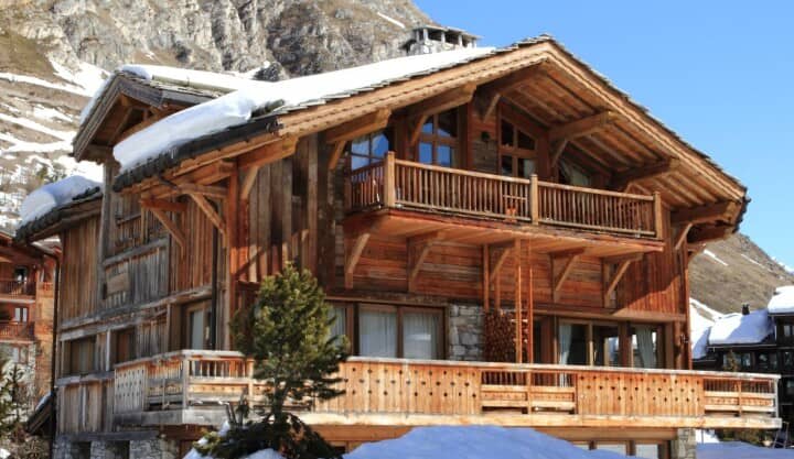 Timber-framed chalet with wrap-around balconies and mountain views