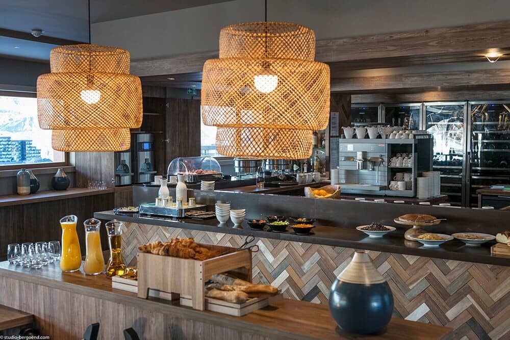 Breakfast bar featuring professional espresso machine and refrigerated wine storage