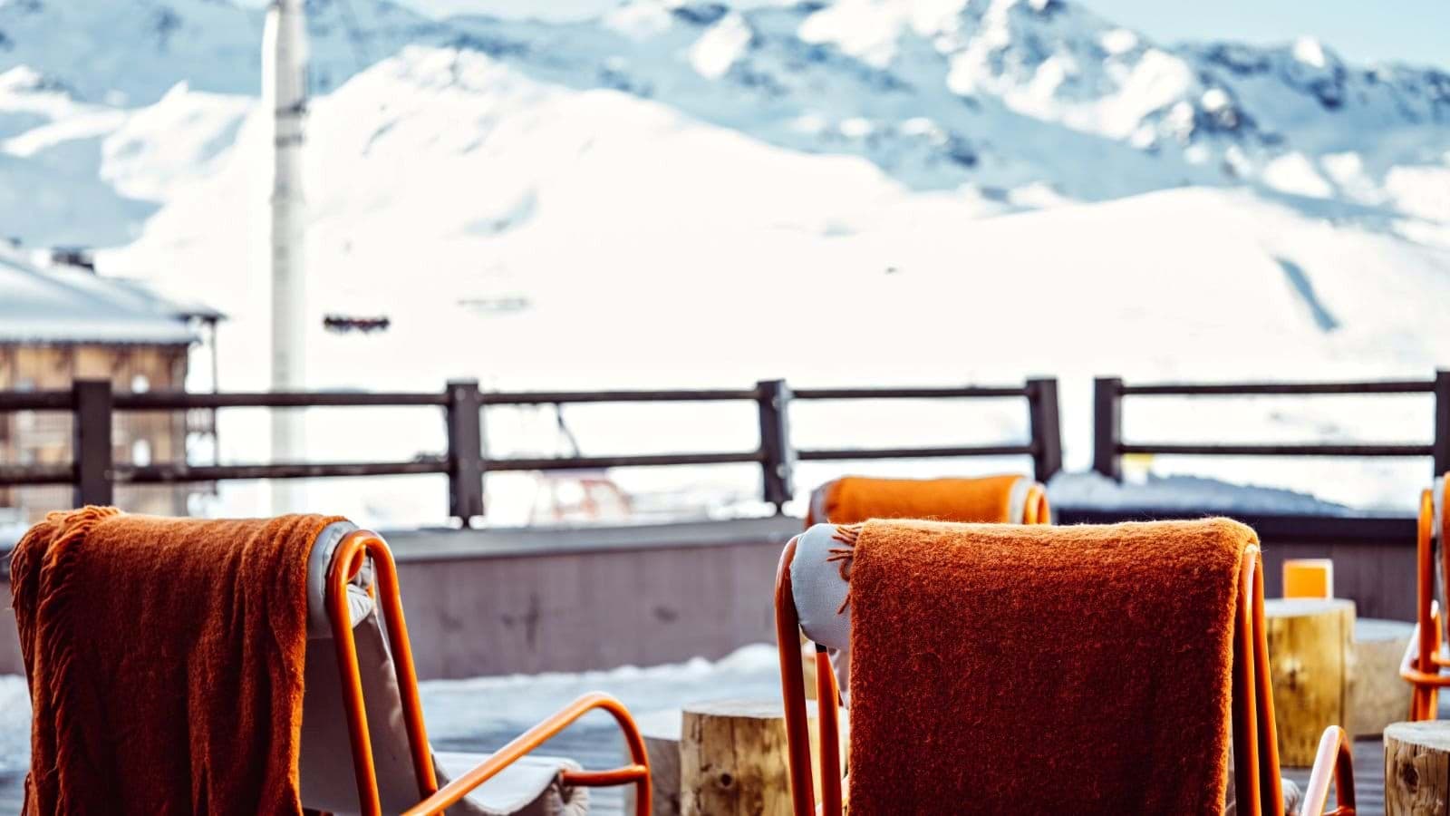 Outdoor terrace with heated seating and panoramic mountain views