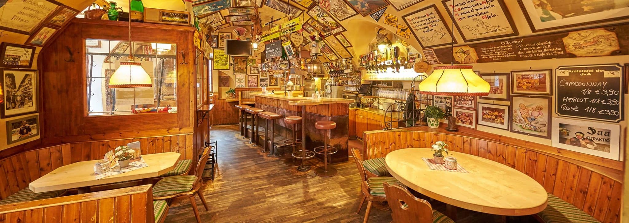 Traditional timber bar and tavern with wood-paneled booth seating