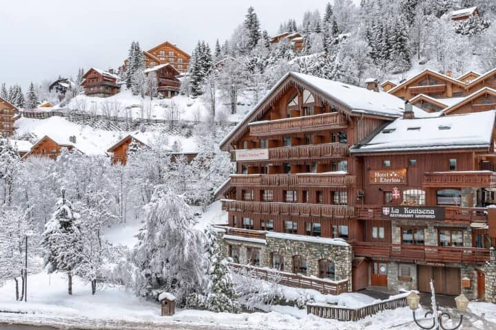 Ski-in/ski-out timber chalet featuring multiple private balconies and on-site restaurant