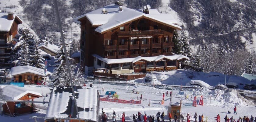 Ski-in/ski-out lodge exterior with restaurant and direct slope access