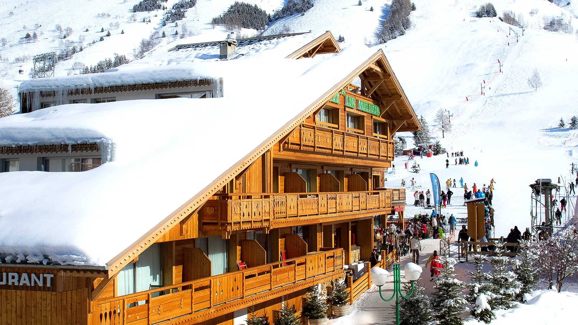 Ski-in/ski-out chalet exterior located directly beside the nursery slopes and ski lift