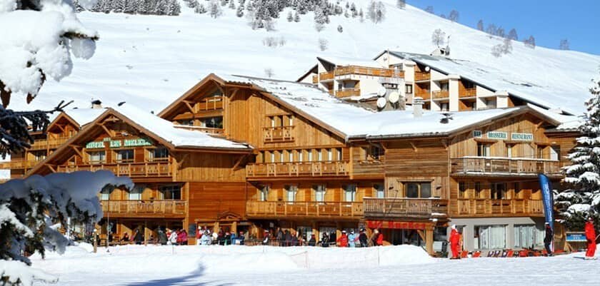 Ski-in/ski-out chalet with timber facade and on-site restaurant and bar