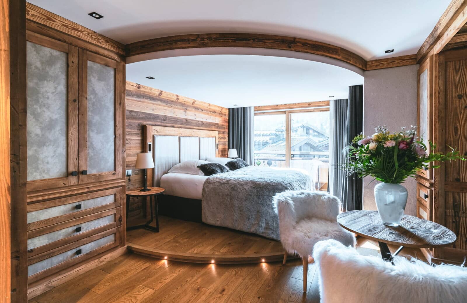 Primary bedroom with king bed and private balcony access