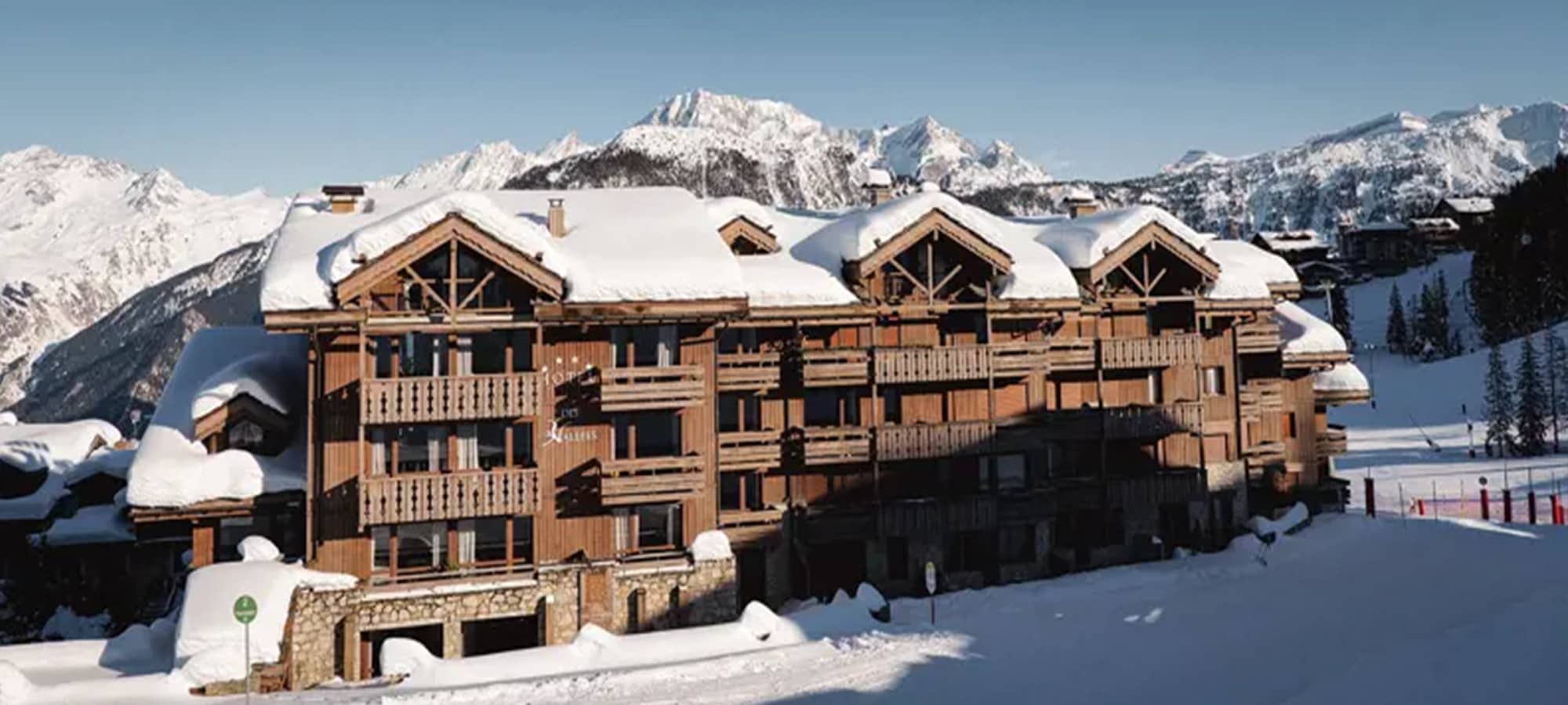 Ski-in, ski-out timber chalet with private balconies and mountain views