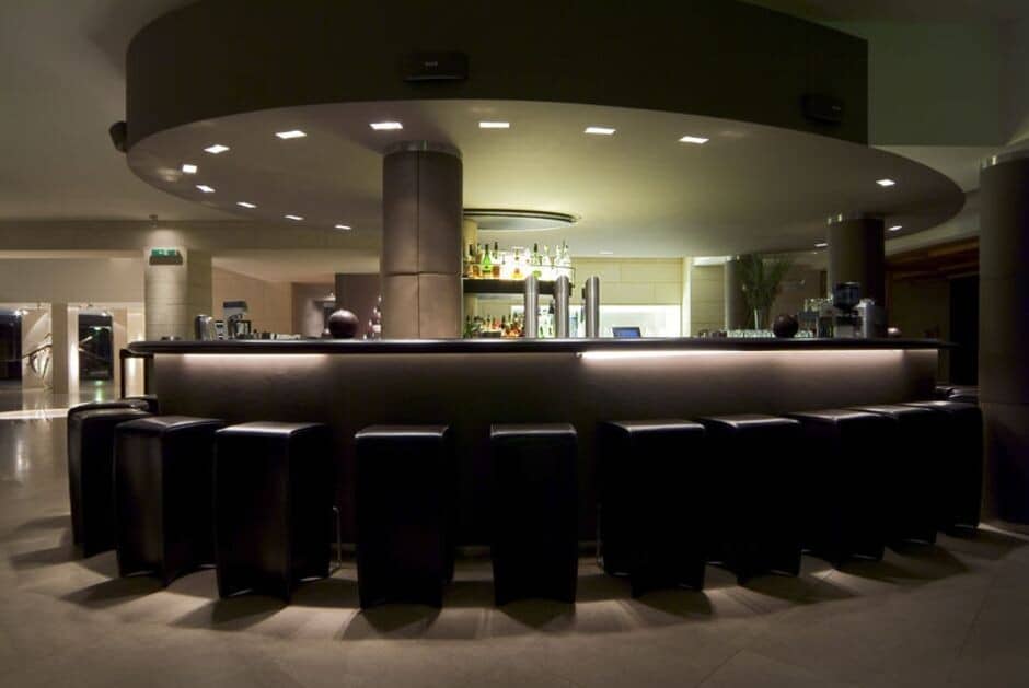 Indoor circular bar with seating for 10 and under-counter lighting