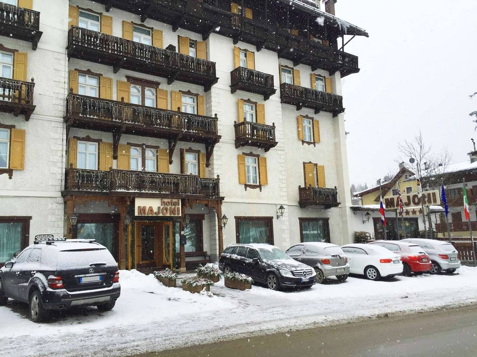 Hotel entrance with guest parking and private balconies