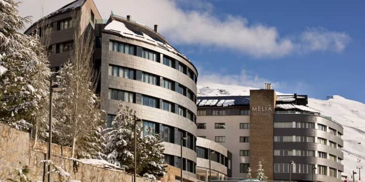 Meliá Sol y Nieve exterior with snowy mountain-side location