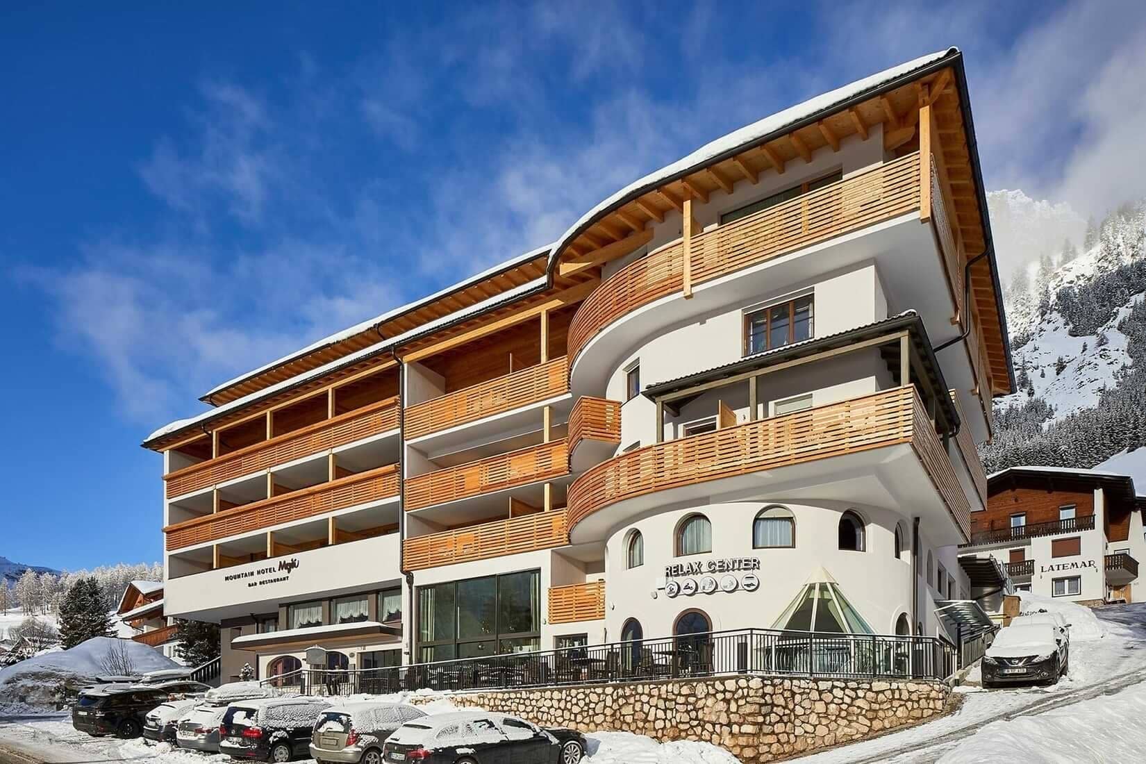 Hotel exterior with private balconies and on-site spa relax center