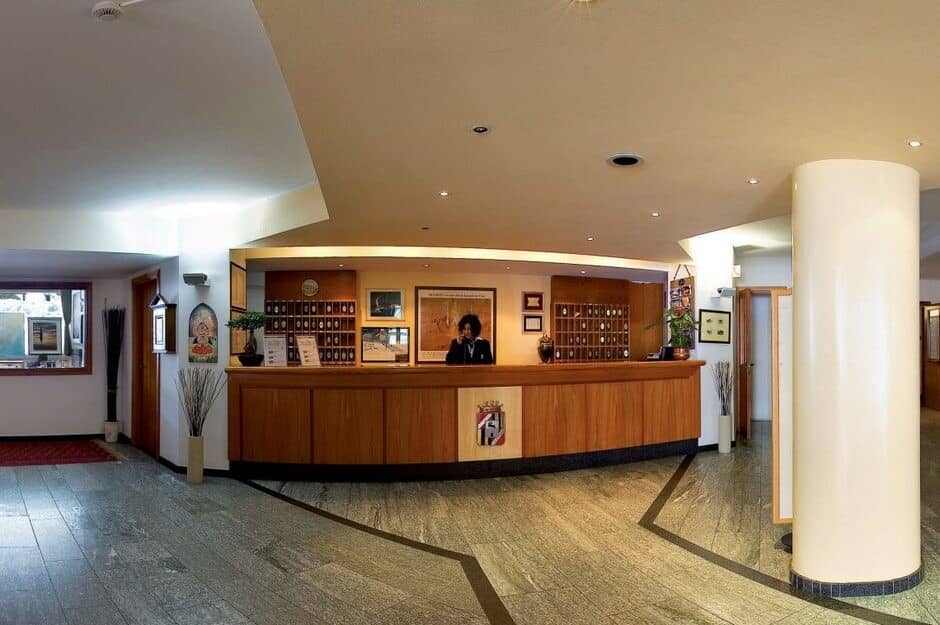 Reception desk with 24-hour staff and traditional key cubbies