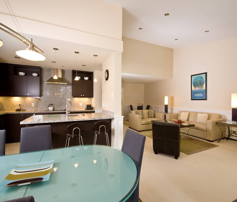 Open-plan layout with kitchen breakfast bar and vaulted ceilings