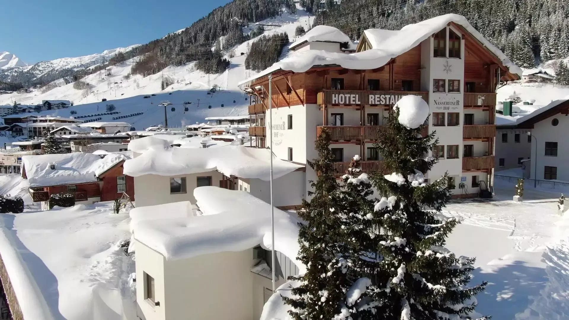 Ski-in/ski-out hotel exterior with direct access to Nasserein gondola and slopes