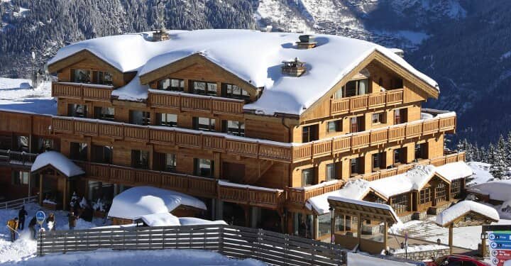 Timber chalet with private balconies and direct ski-in/ski-out access