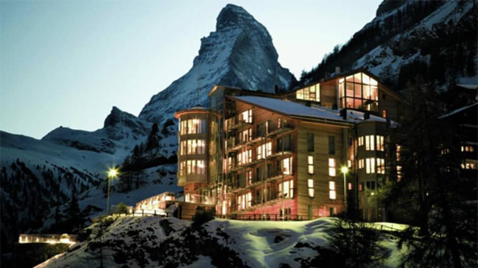 Chalet exterior at dusk with direct views of the Matterhorn