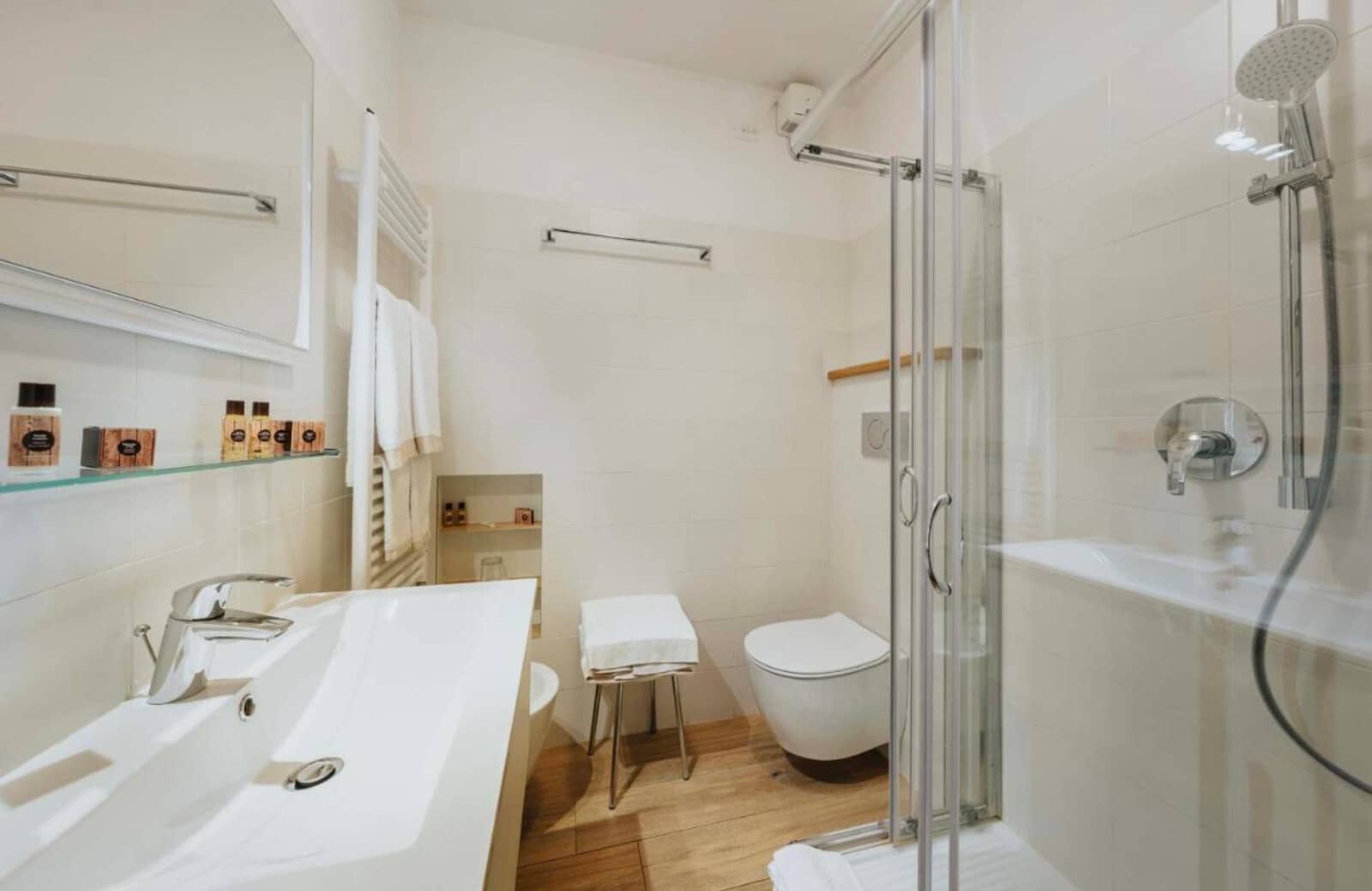 Bathroom with walk-in shower and heated towel rail