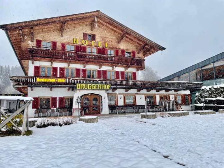 Chalet exterior with on-site restaurant and cafe; outdoor terrace seating