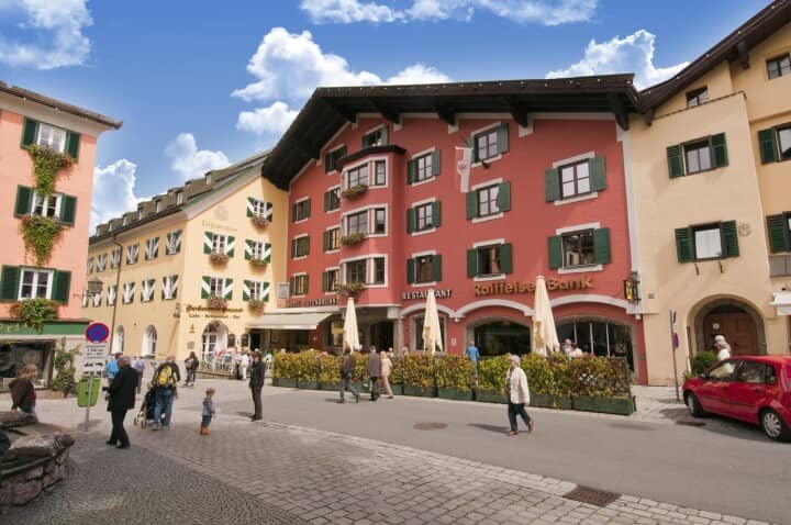 Building exterior located in pedestrian village near restaurants and banking