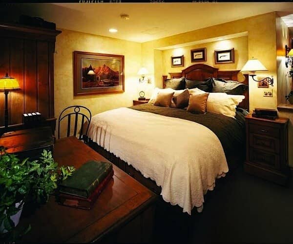 Guest bedroom with king bed and dedicated workspace