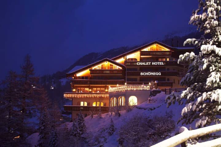 Chalet hotel exterior with private balconies and mountain view terrace