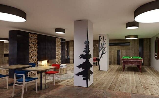 Lower level lounge with pool table, fireplace, and café seating