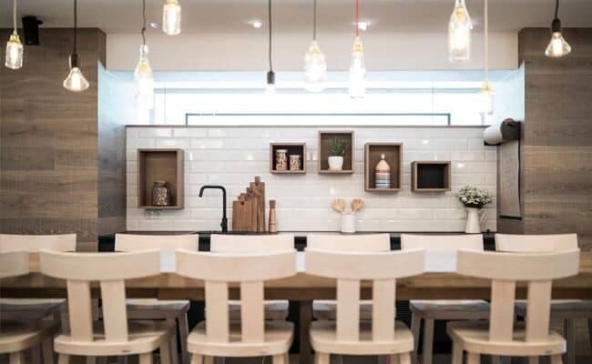 Kitchen bar seating for six with subway tile backsplash