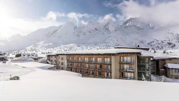 Ski-in, ski-out resort building with private balconies and mountain views