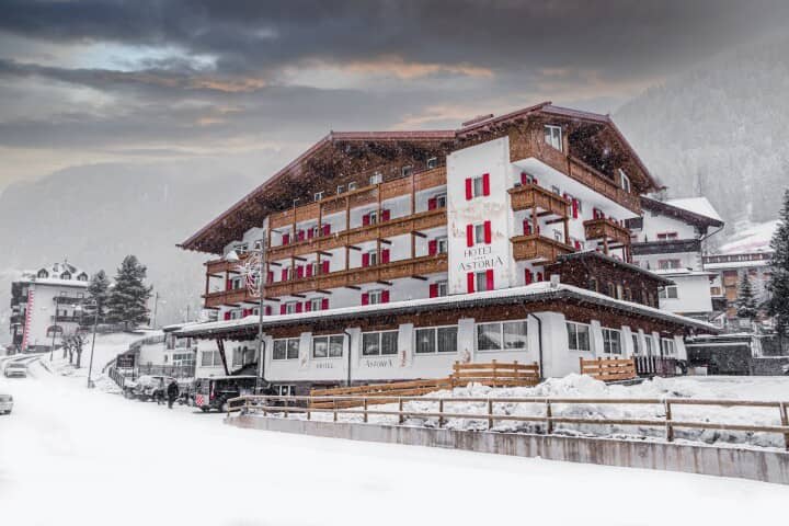 Hotel exterior featuring private balconies with mountain and valley views