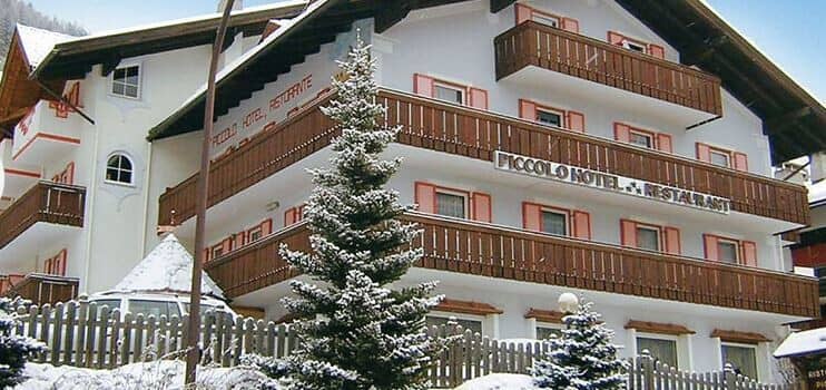 Chalet exterior with multiple private balconies and on-site restaurant