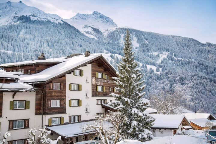 Chalet exterior with mountain views and proximity to ski slopes
