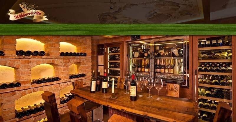 Wine cellar with tasting table and temperature-controlled storage