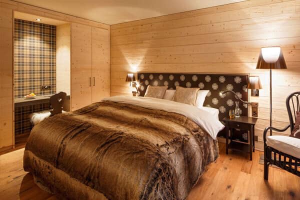 Bedroom with king bed, built-in wardrobe, and integrated desk nook