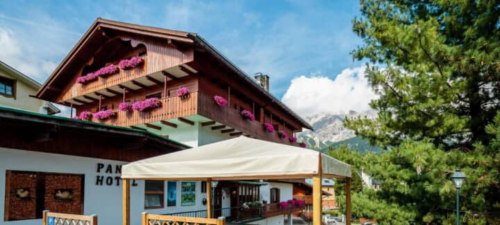 Chalet exterior with private balconies and mountain views