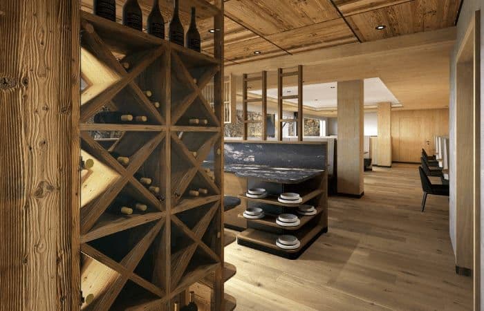 Wine room with custom wooden racks and stone serving counter