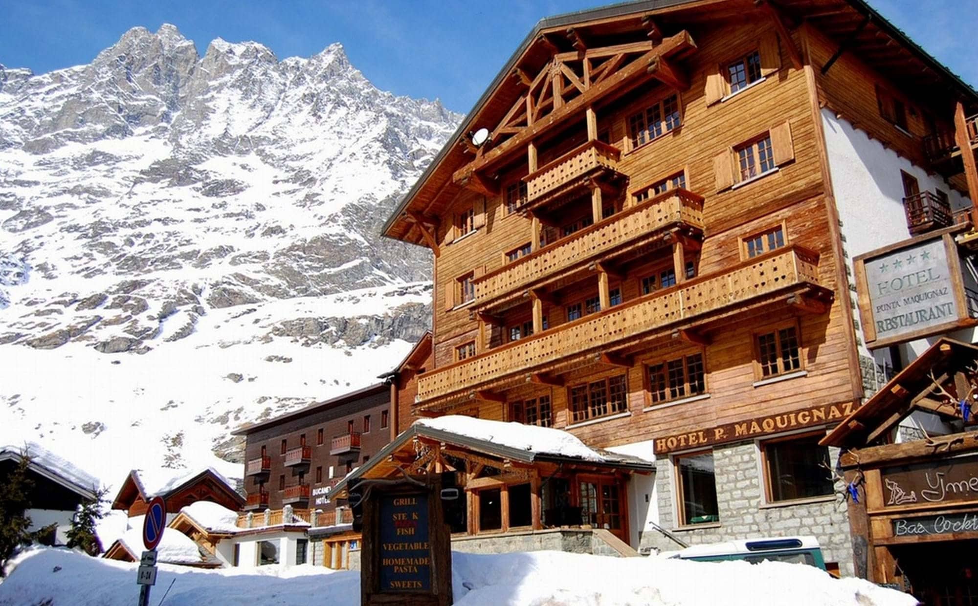 Ski-in/ski-out timber chalet with private balconies and Matterhorn views