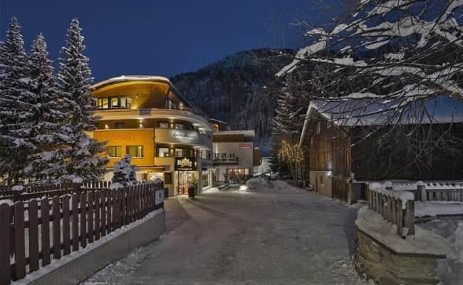Ski-in/ski-out access road near local shops and mountain slopes